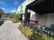Exterior view of a Starbucks with a patio and landscaping at 306 E Paris St, Tampa, FL 33604