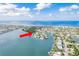Charming waterfront island community with lush greenery and clear waters at 307 10Th Ave, Indian Rocks Beach, FL 33785