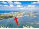 Expansive aerial shot of the coastal area, showcasing the surrounding waterfront properties and beaches at 307 10Th Ave, Indian Rocks Beach, FL 33785