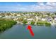 High-angle shot highlighting the home's location on a peninsula with easy water access at 307 10Th Ave, Indian Rocks Beach, FL 33785