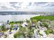 High-angle view of a waterfront property nestled within a residential community at 307 10Th Ave, Indian Rocks Beach, FL 33785