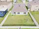 House with backyard, fence, and spacious lawn at 33510 Elm Hill Branch, Wesley Chapel, FL 33545