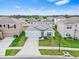 House with a two-car garage and landscaping at 33510 Elm Hill Branch, Wesley Chapel, FL 33545