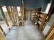 Bathroom under renovation with exposed framing and tiled floor at 415 86Th Ave, St Pete Beach, FL 33706