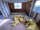Empty bedroom with insulation, window, and unfinished walls at 415 86Th Ave, St Pete Beach, FL 33706
