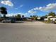 One-story home with a driveway and front yard at 415 86Th Ave, St Pete Beach, FL 33706