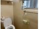 Simple bathroom with toilet, sink, and storage at 5136 Skyland Dr, Holiday, FL 34690