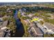 Aerial view of a townhome community, showcasing a property near the water at 6289 93Rd N Ter # 4302, Pinellas Park, FL 33782