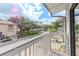 View from balcony showcases a tree-lined street and neighboring homes at 6289 93Rd N Ter # 4302, Pinellas Park, FL 33782