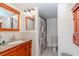 Clean bathroom with granite countertop vanity and shower at 6289 93Rd N Ter # 4302, Pinellas Park, FL 33782