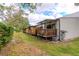 Townhouses with private decks and mature trees in the background at 6289 93Rd N Ter # 4302, Pinellas Park, FL 33782
