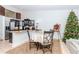 Eat-in kitchen with granite countertop and stainless steel appliances at 6289 93Rd N Ter # 4302, Pinellas Park, FL 33782