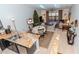 Open concept kitchen with granite countertops and view into living room at 6289 93Rd N Ter # 4302, Pinellas Park, FL 33782