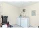 Functional laundry room with washer and dryer at 6289 93Rd N Ter # 4302, Pinellas Park, FL 33782