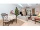 Living room with vaulted ceiling, skylights, and access to patio at 6289 93Rd N Ter # 4302, Pinellas Park, FL 33782