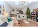 Bright living room featuring a Christmas tree and comfortable seating at 6289 93Rd N Ter # 4302, Pinellas Park, FL 33782
