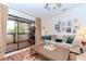 Living room with patio access and a cozy atmosphere at 6289 93Rd N Ter # 4302, Pinellas Park, FL 33782