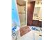 Modern bathroom with a walk-in shower, double vanity, and ample storage at 644 Blue Nw Ln, Port Charlotte, FL 33952