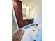 Updated bathroom featuring double sinks, a shower, and ample storage space at 644 Blue Nw Ln, Port Charlotte, FL 33952