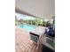 Inviting screened-in pool area with patio furniture, perfect for relaxing at 644 Blue Nw Ln, Port Charlotte, FL 33952