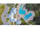 An aerial view of the community pool with a splash park at 13010 Wildflower Meadow Dr, Riverview, FL 33579