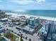 Expansive overhead view of the neighborhood featuring local businesses, a beautiful beach and the ocean at 15 Avalon St # 704, Clearwater Beach, FL 33767