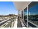 Private balcony offers an outdoor seating area and stunning city and water views at 15 Avalon St # 704, Clearwater Beach, FL 33767