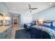 View of bedroom with two beds and ceiling fan at 15 Avalon St # 704, Clearwater Beach, FL 33767