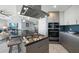 Stylish kitchen featuring a gas range, stainless steel hood, and sleek cabinetry at 15 Avalon St # 704, Clearwater Beach, FL 33767