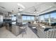 Bright open-concept living space with views, chef's kitchen, and tray ceilings at 15 Avalon St # 704, Clearwater Beach, FL 33767