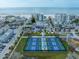 Aerial view of newly constructed community pickleball courts near beach at 15 Avalon St # 704, Clearwater Beach, FL 33767