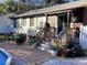 Backyard patio with pool and lounge seating at 1529 Paloma Ln, Dunedin, FL 34698