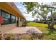 Backyard patio with brick pavers and lush landscaping at 19029 Us Highway 19 # 25D, Clearwater, FL 33764