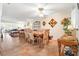 Inviting dining room with tile floors, stylish furnishings, and an open concept layout at 19029 Us Highway 19 # 25D, Clearwater, FL 33764