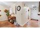 Welcoming entryway with tile floors and access to the kitchen at 19029 Us Highway 19 # 25D, Clearwater, FL 33764