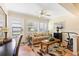 Florida room with tile flooring, seating, and exercise equipment at 19029 Us Highway 19 # 25D, Clearwater, FL 33764