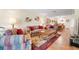 Living room with tile flooring, cozy seating, and decorative accents at 19029 Us Highway 19 # 25D, Clearwater, FL 33764