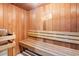 Relaxing sauna with wooden benches and a 