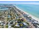 Aerial view showcasing the property's proximity to the beach and surrounding neighborhood at 24 160Th Ct, Redington Beach, FL 33708