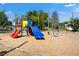 Playground with slides, swings, and climbing structures at 3625 Greatwood Ct, Land O Lakes, FL 34639