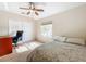 Simple bedroom with ceiling fan, closet, and carpeted floor at 4401 Har Paul Cir, Tampa, FL 33614