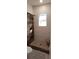 Bathroom with walk-in shower featuring wood-look tile and subway tile at 4402 Sailplane Ct, Wesley Chapel, FL 33545