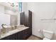 Modern bathroom with granite vanity, shower, and bathtub at 4810 W Mcelroy Ave # 2, Tampa, FL 33611
