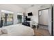 Spacious bedroom with window, desk and hardwood floors at 4810 W Mcelroy Ave # 2, Tampa, FL 33611