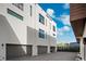 Rear view of modern townhouses with attached garages at 4810 W Mcelroy Ave # 2, Tampa, FL 33611