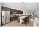 Modern kitchen with island, stainless steel appliances, and open floor plan at 4810 W Mcelroy Ave # 2, Tampa, FL 33611