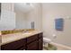 Bathroom with granite vanity, shower/tub combo, and neutral decor at 5432 Layton Dr, Venice, FL 34293