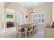 Bright dining room with a large table and neutral decor at 636 Citrus Wood Ln, Valrico, FL 33594