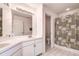 Bright bathroom with double vanity and separate shower/tub at 8620 Brookway Cir, Tampa, FL 33635