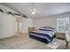 Large bedroom with carpeted floors and ensuite bathroom access at 8620 Brookway Cir, Tampa, FL 33635